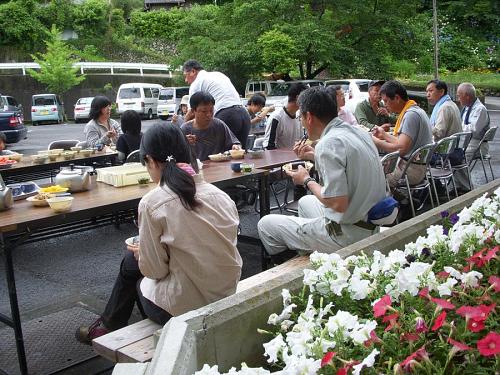 Even with a chance of rain, everyone likes to eat outdoors when they've been working outdoors