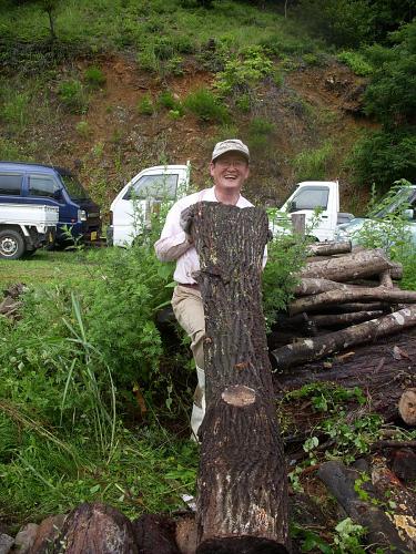 On the other hand, here we have the Face of Awafu Forestry Management, dear Nikolai. Clumsy and goofy, holder of the teabreak whistle. You can generally tell who is serious about their work by whether they make a smile for the camera or not.