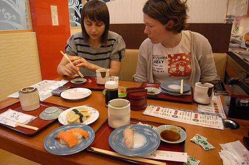 Chan borrowed my camera. Eating sushi in Tokushima City with Andrea.