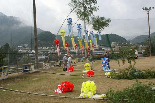 Setting up the Tanabata decorations.