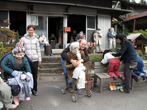 The Hall(?) of Scarecrows is along route 438 in Koyadaira, Mima City. Apparently the wife of the man running the gas station next door learned from a teacher in Kamiyama and started making them and placing them here.